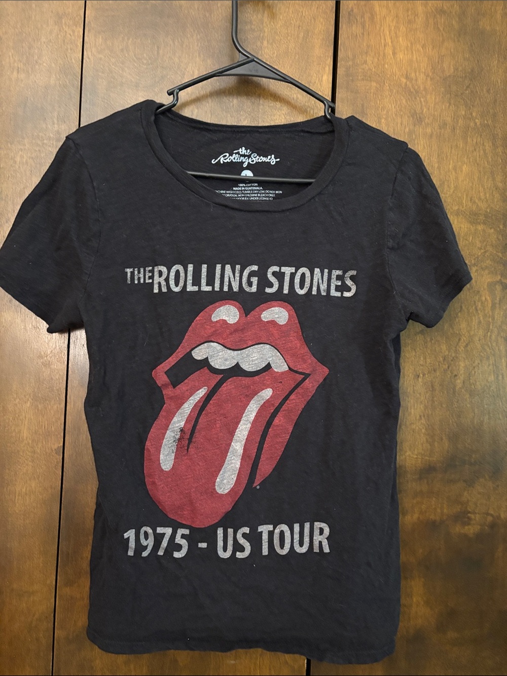 the Rolling Stones Black Tee with Red Tongue Graphic and White Text